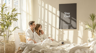  Couple in light robes enjoying sunlit, cool bedroom