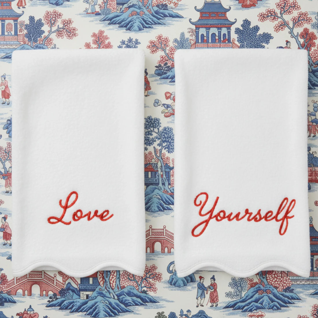 Self-care lovers' white scalloped cotton washcloths with red Love Yourself embroidery for spa-quality comfort - Lotus Linen