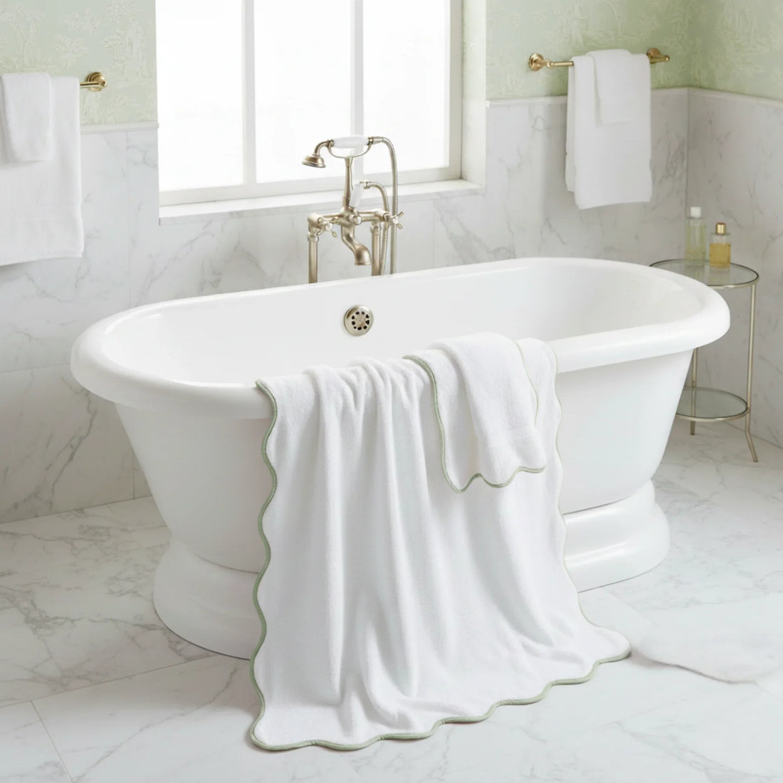 Luxury seekers' oversized scallop-edge bath sheet in white with sage trim draped over freestanding tub for spa-worthy softness - Lotus Linen