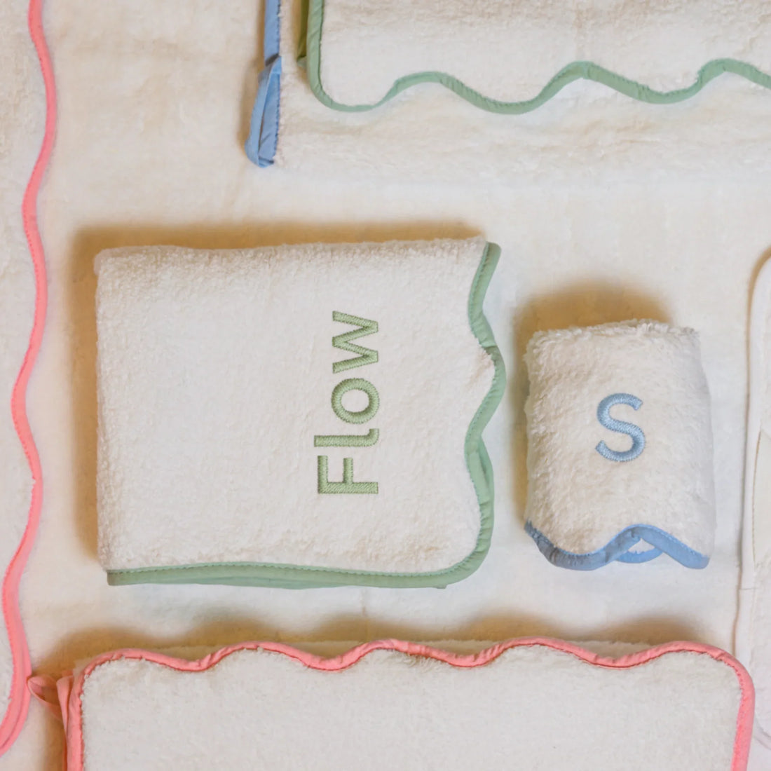 Personalized luxury scallop-piped cotton bath mat in cream with sage green trim for spa-quality comfort at home - Lotus Linen