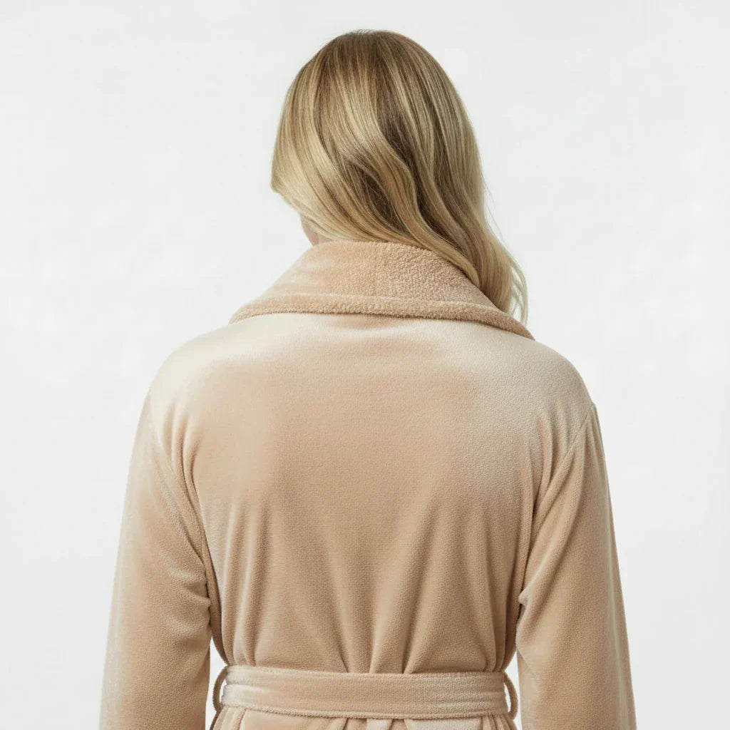 Woman wearing ultra soft plush bathrobe in warm sand with cozy shawl collar for spa-quality comfort - Lotus Linen