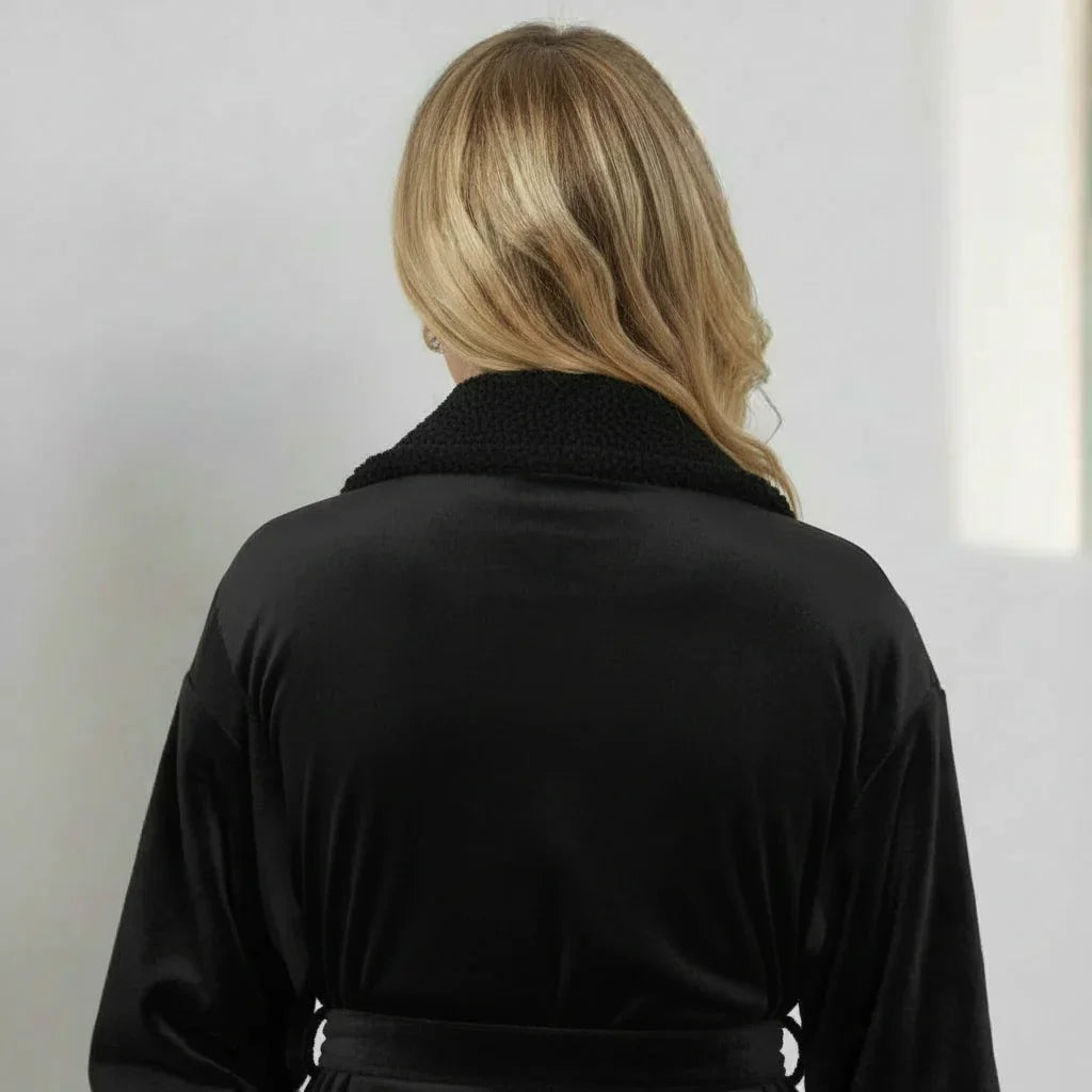 Woman wearing ultra soft black plush bathrobe with cozy textured collar for spa-quality comfort at home - Lotus Linen