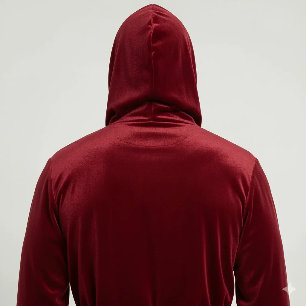Man wearing deep burgundy hooded plush robe for cozy spa-quality comfort at home - Lotus Linen