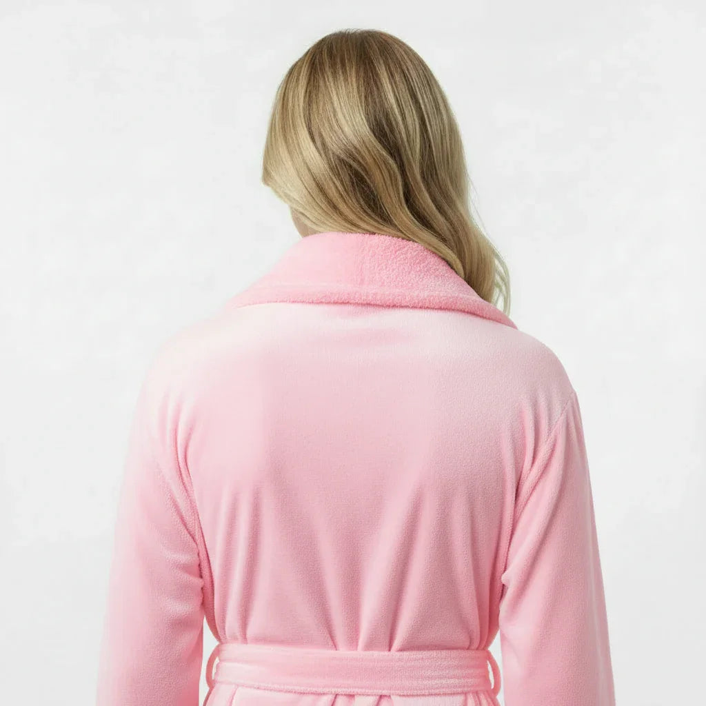 Woman wearing soft pink plush bathrobe with cozy shawl collar for spa-quality comfort at home - Lotus Linen