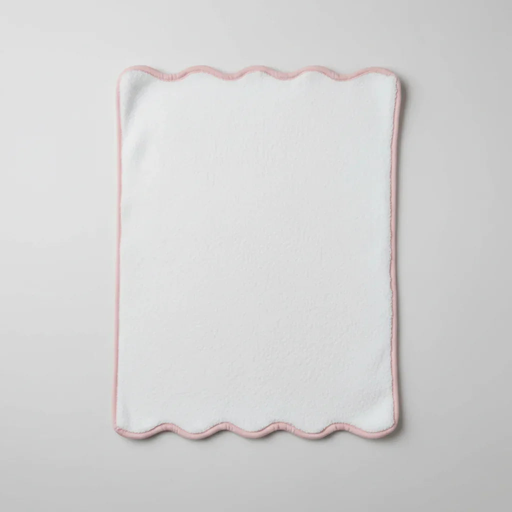 Soft white bath towel with delicate pink scalloped edge for luxurious spa-quality comfort at home - Lotus Linen
