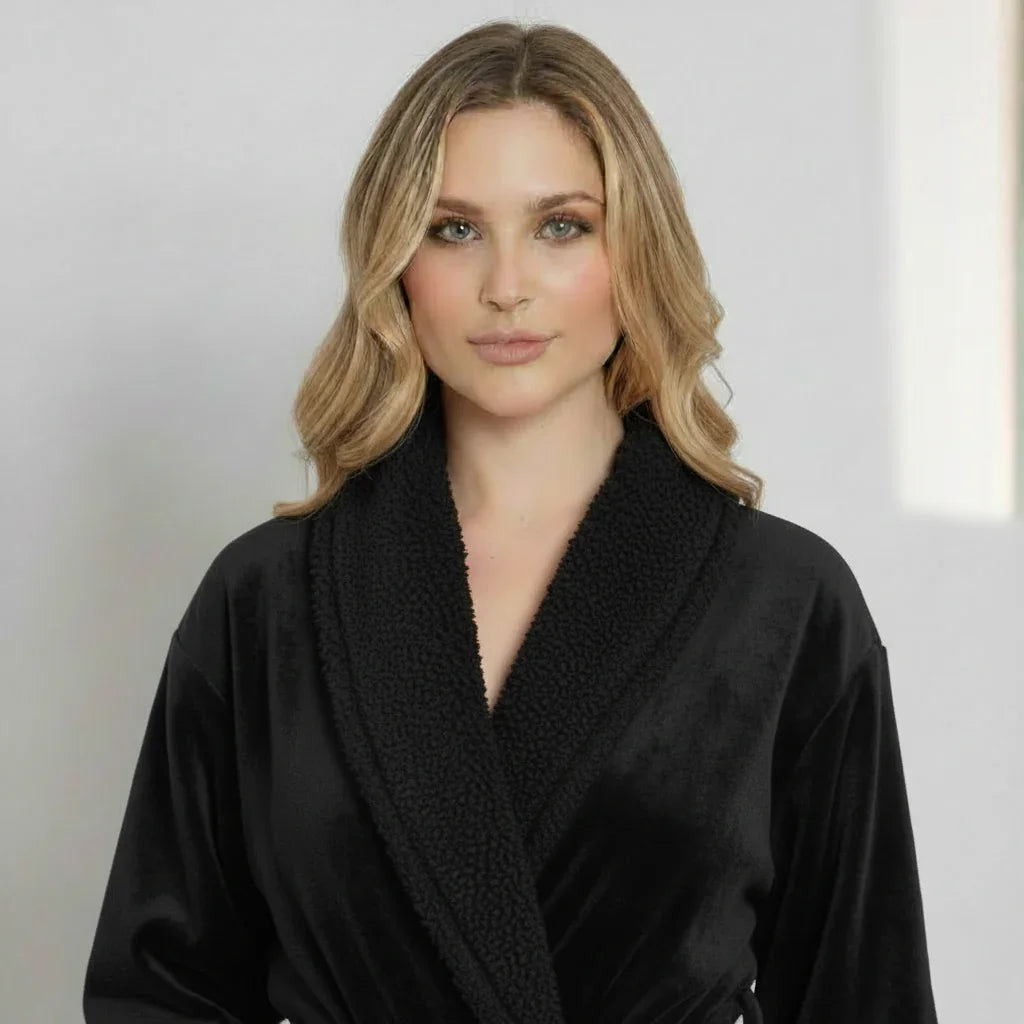 Woman modeling ultra soft plush bathrobe in black with sherpa collar for cozy spa-quality comfort - Lotus Linen