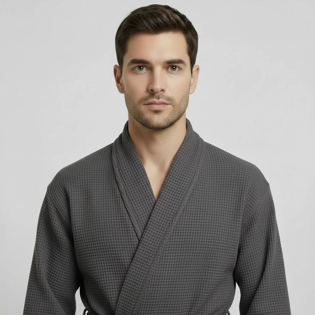Man wearing charcoal waffle spa bathrobe for lightweight breathable comfort after every shower - Lotus Linen