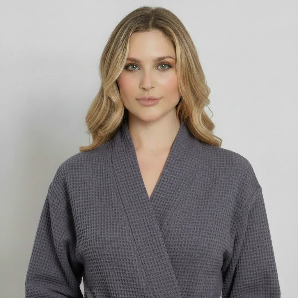 Woman in grey waffle-weave knee-length robe enjoying spa-quality comfort at home - Lotus Linen