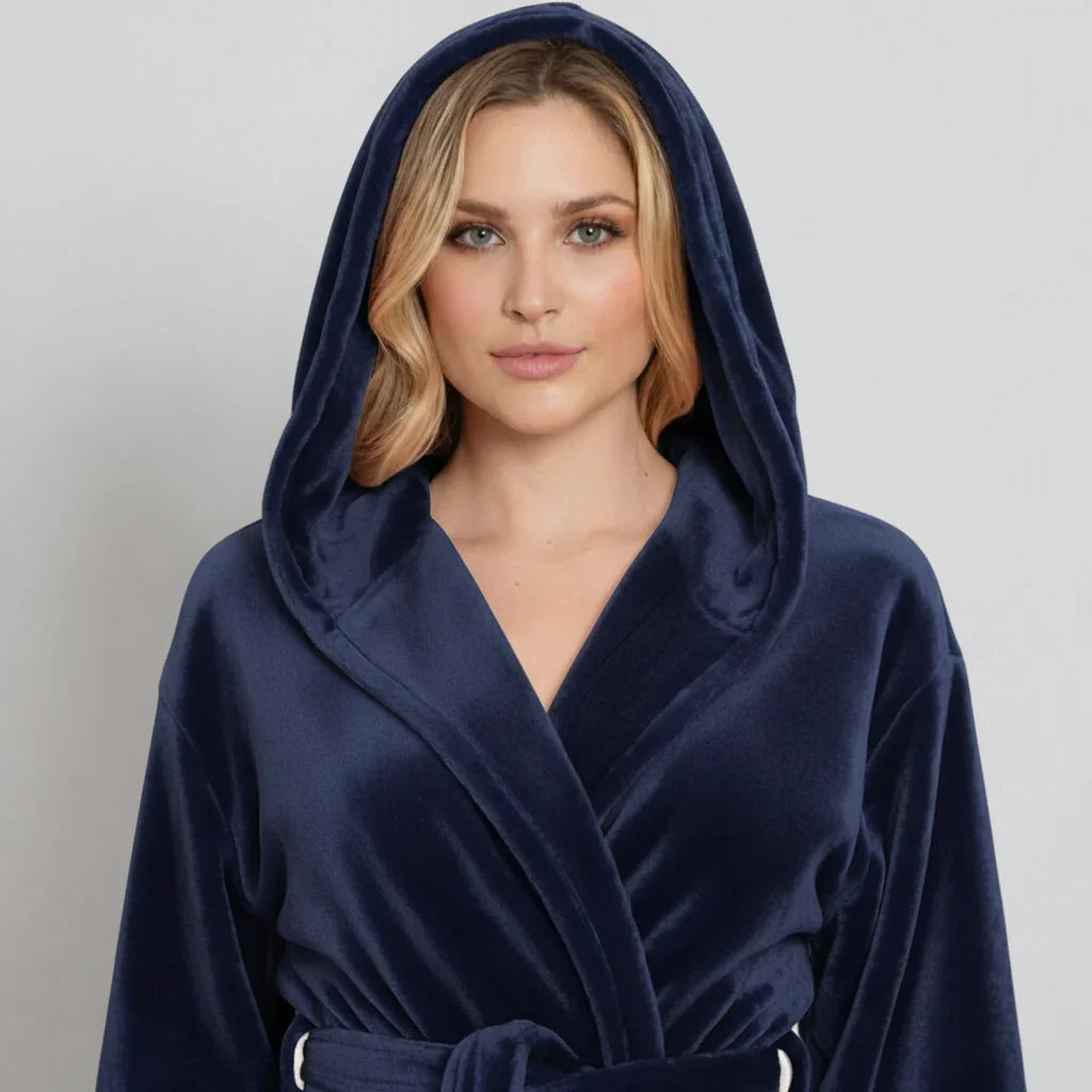 Woman wearing navy plush hooded robe for cozy spa-worthy relaxation at home - Lotus Linen