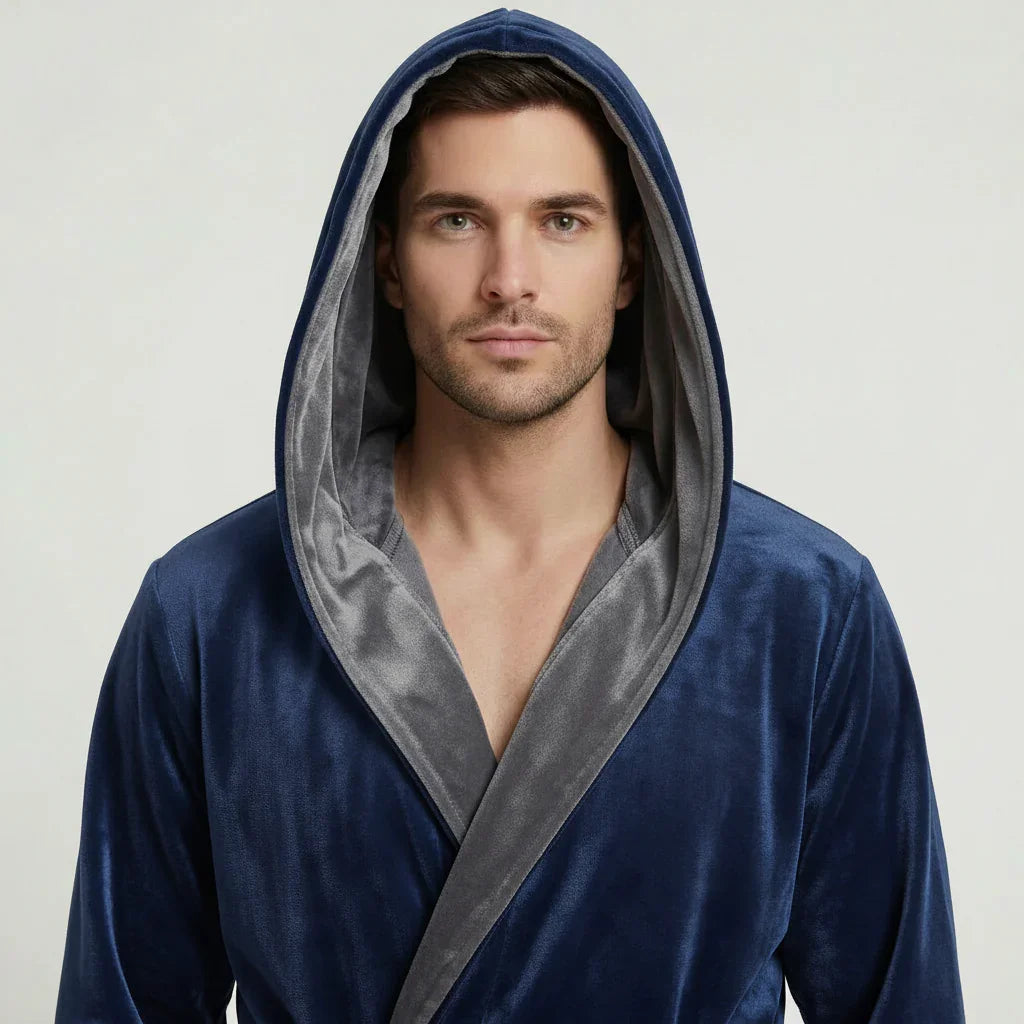 Man wearing navy blue hooded plush robe with grey trim for cozy spa-quality comfort at home - Lotus Linen