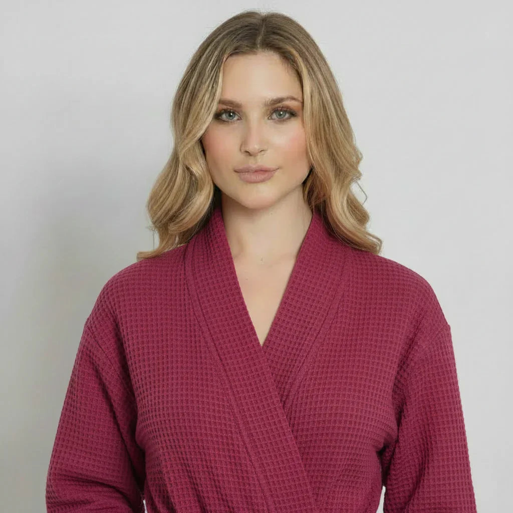 Woman wearing raspberry waffle weave robe with kimono collar for lightweight spa-quality comfort - Lotus Linen