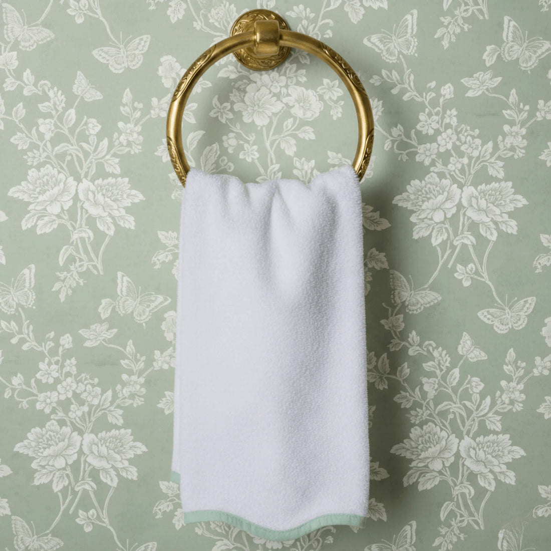 Soft white bath towel with mint trim on gold ring holder offering spa-quality comfort for your daily routine - Lotus Linen