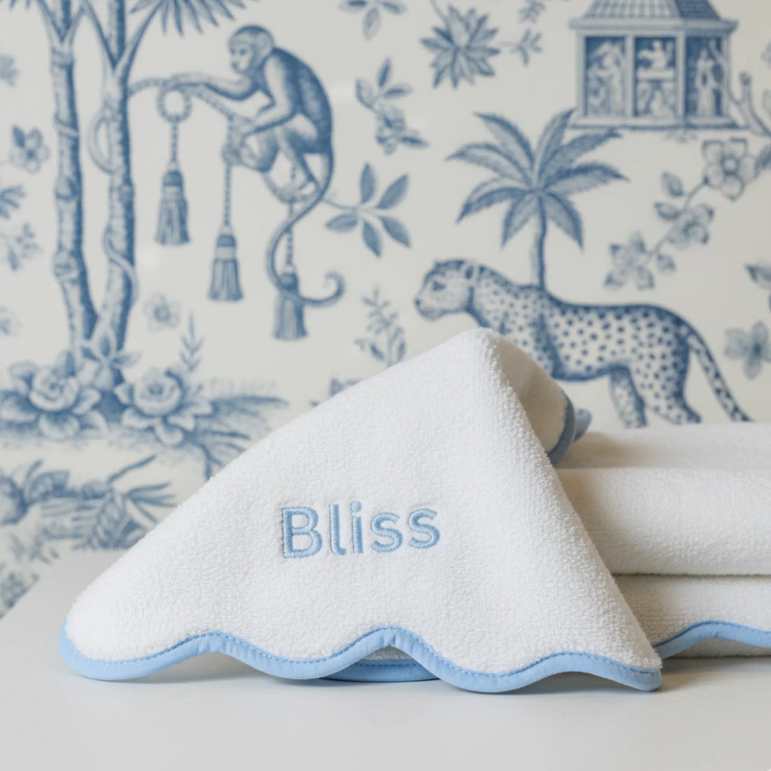 Personalized luxury cotton hand towel with blue scallop piping for spa-quality comfort at home - Lotus Linen