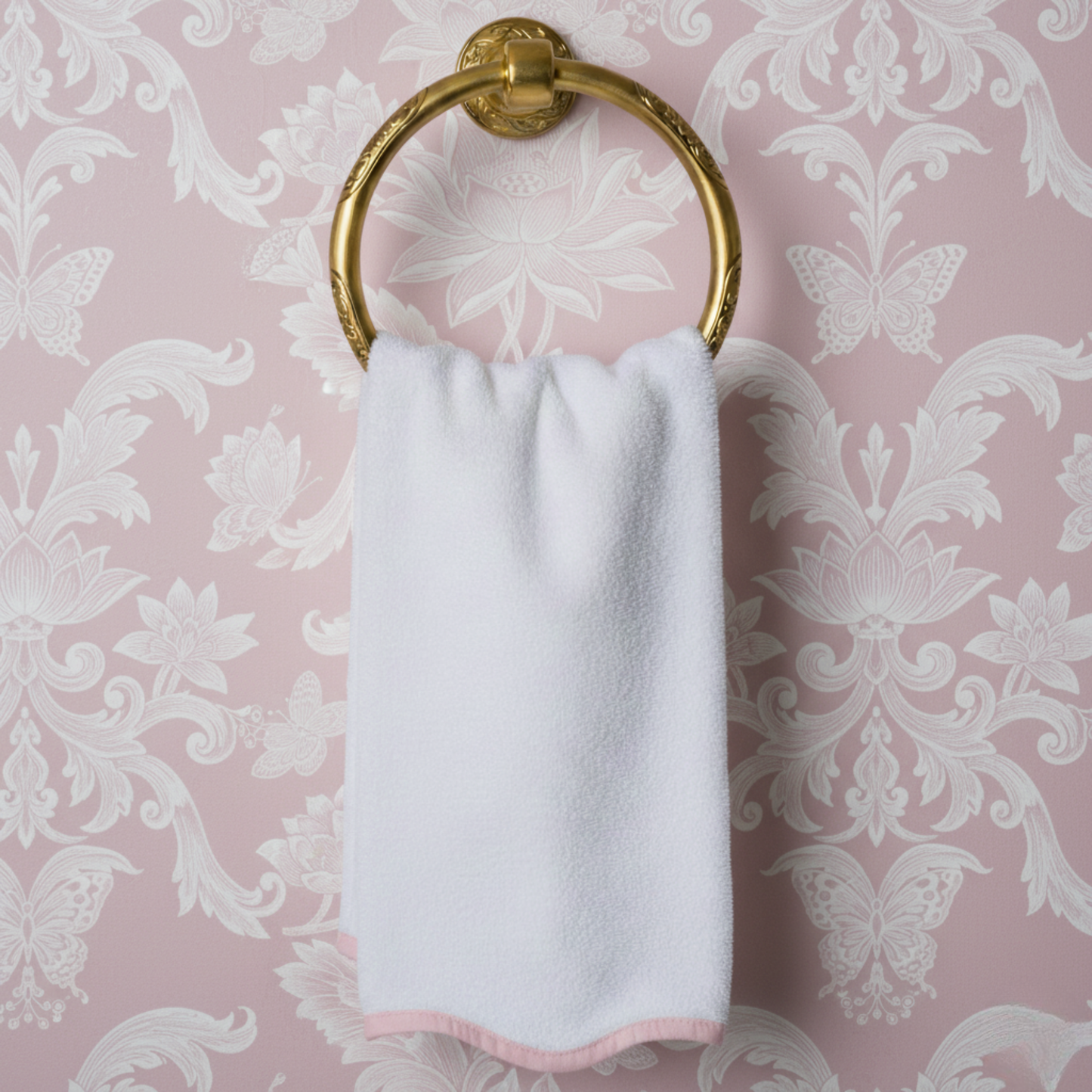 White cotton hand towel with pink scallop piping on gold ring holder for elegant spa-quality comfort at home - Lotus Linen