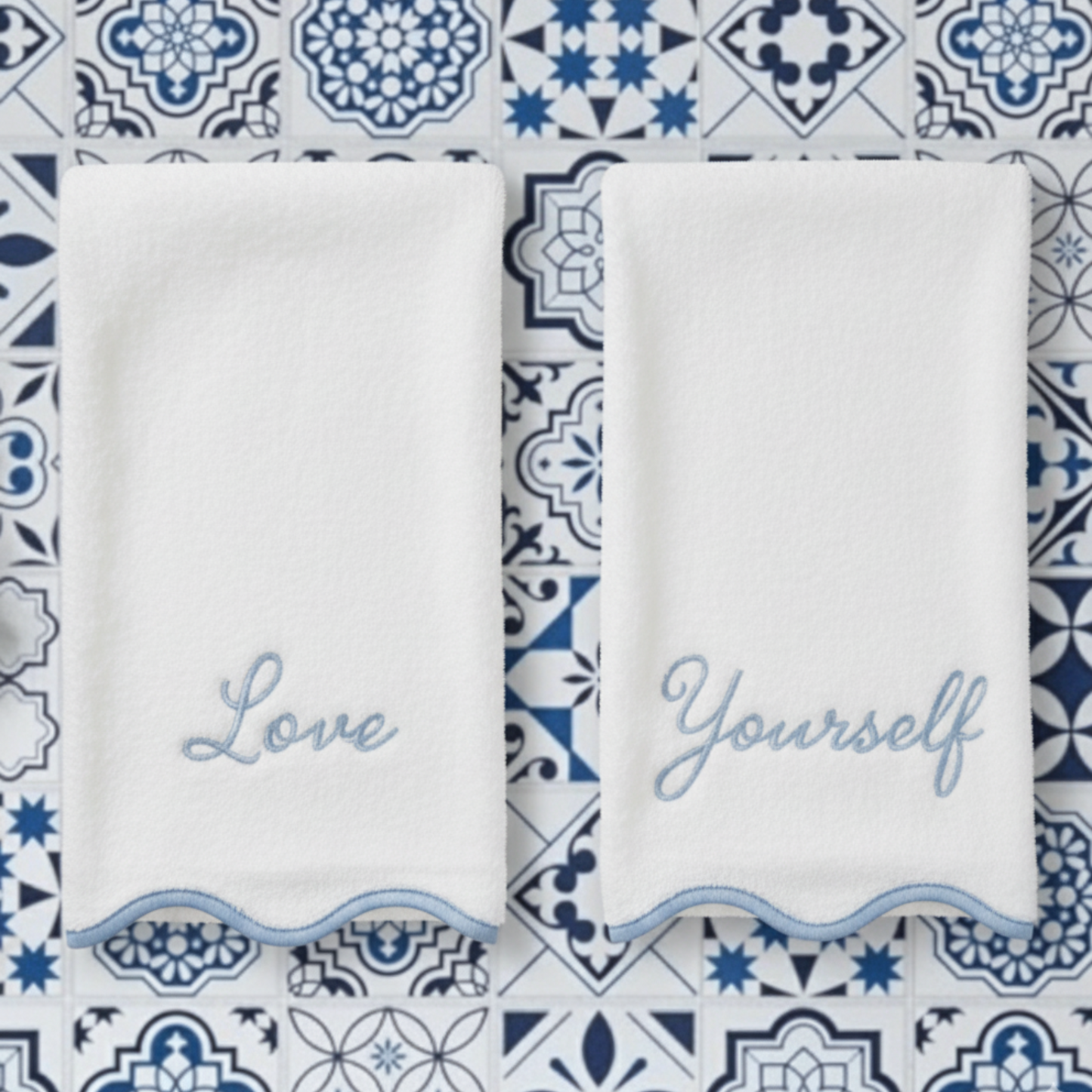 Pair of white scallop-edge bath towels with blue Love Yourself embroidery for a serene spa-like retreat - Lotus Linen