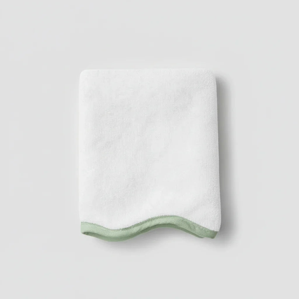 Soft white luxury cotton washcloth with sage green scallop piping for everyday spa-quality comfort - Lotus Linen