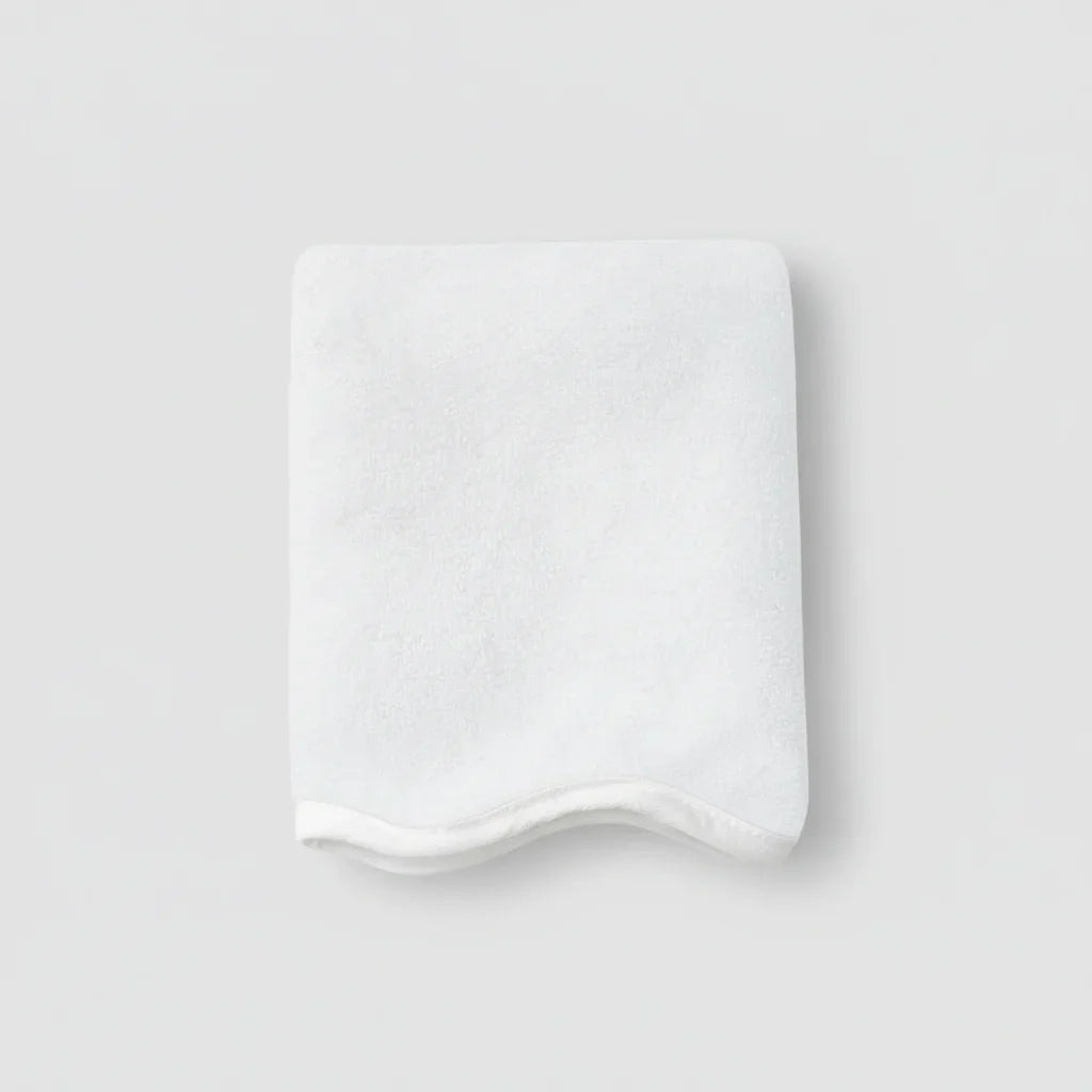 Soft white cotton washcloth with elegant scallop piping for spa-quality comfort at home - Lotus Linen