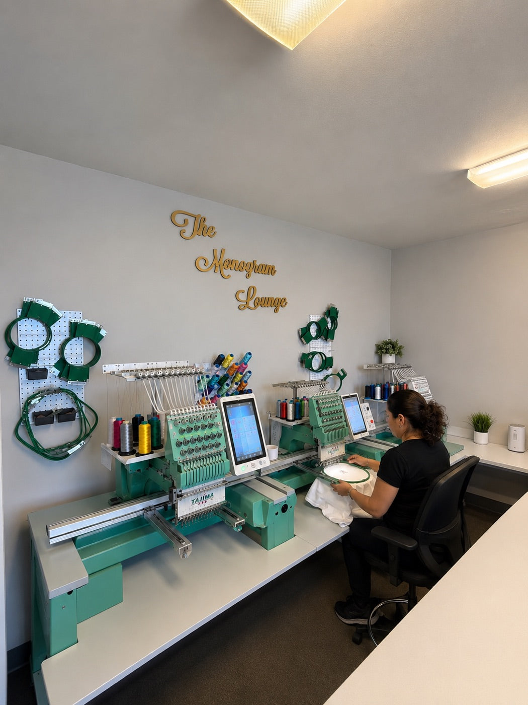 The Monogram Lounge — Lotus Linen's in-house embroidery room in Orange County, California